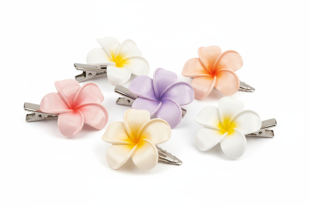 Add a touch of floral elegance to your hairstyle with this set of 5 plumeria-inspired hair clips. Crafted with a glossy finish and soft pastel tones, these clips are perfect for daily wear, festive styling, or gifting. Each clip offers a strong grip and a lightweight feel, making them both stylish and practical.